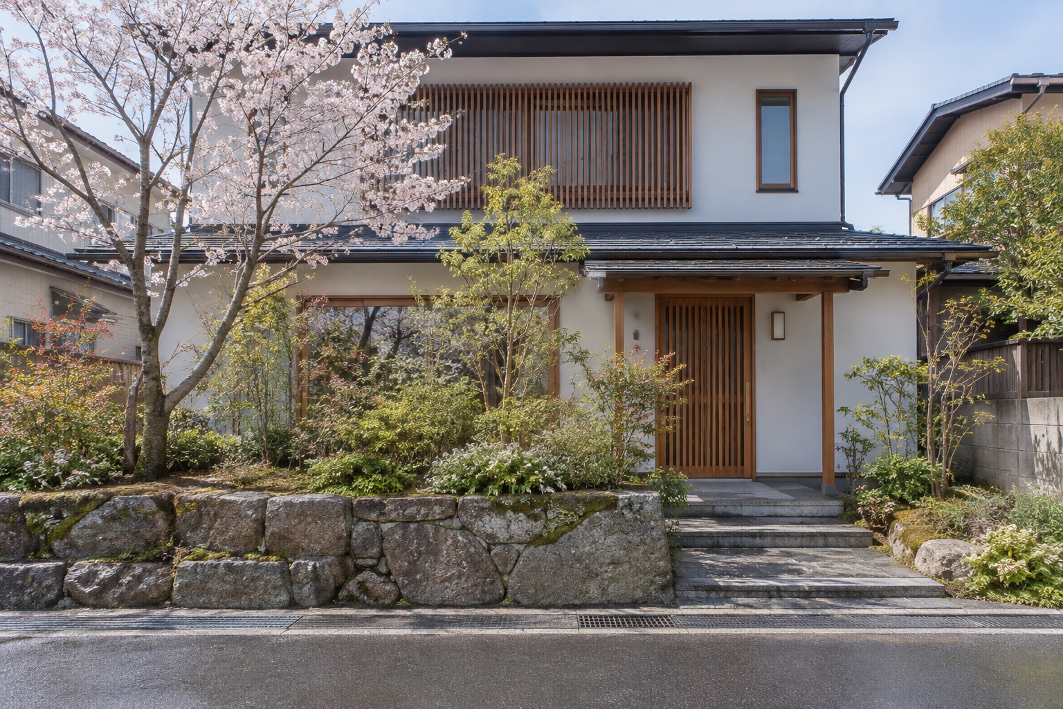 低い石塀と植栽のある住宅の参考イメージ